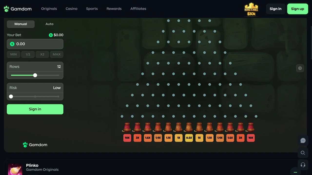 Gamdom Plinko, 12 riviä ja Low: keskellä 0,5×, ulkoreunoilla 10×.